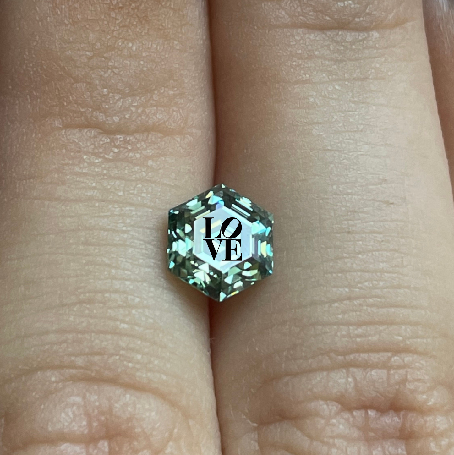 Moissanite Octogonal Ring With LOVE Laser Engraved On The Diamond