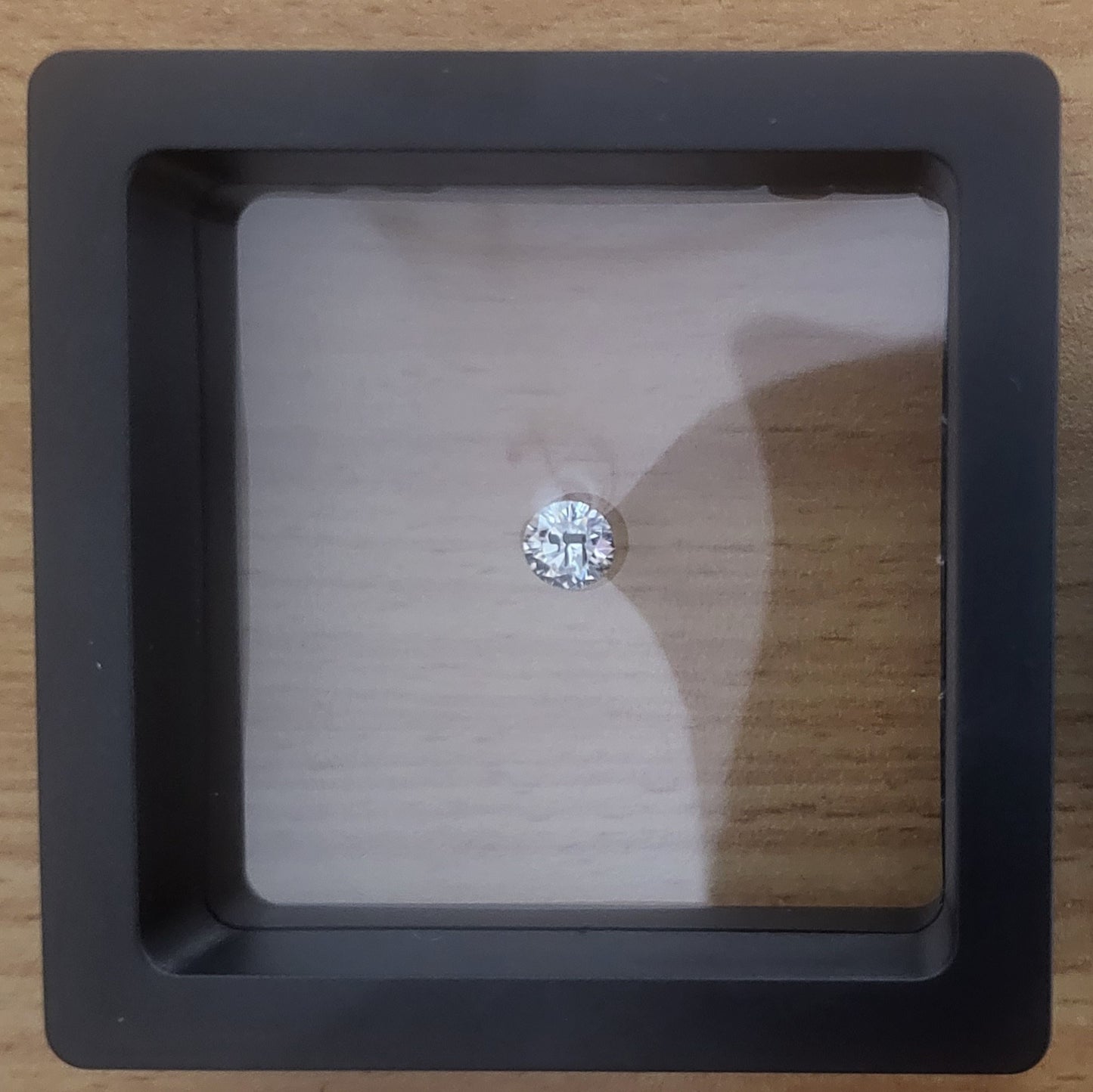 Laser Engrave On Moissanite Round Cut Chai Engraved