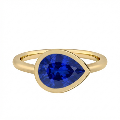 טבעת חותם אבן ספיר מעבדה בצורת טיפה בצבע כחול שיבוץ בזל זהב 14 קראט לבן/צהוב/רוז גולד Lab Grown Sapphire Royal Blue